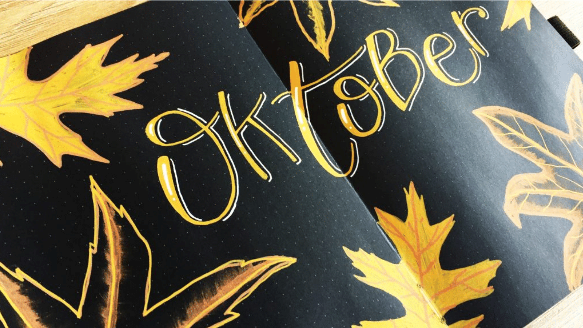Leer herfstbladeren tekenen in je bullet journal met zwart papier